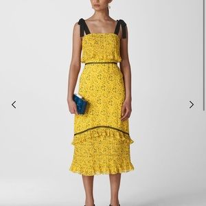 Whistles New dress tie-detailing on the shoulders. It is true to size.